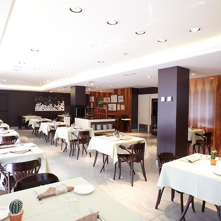 Hotel Mu La Cortinada Ресторан фото